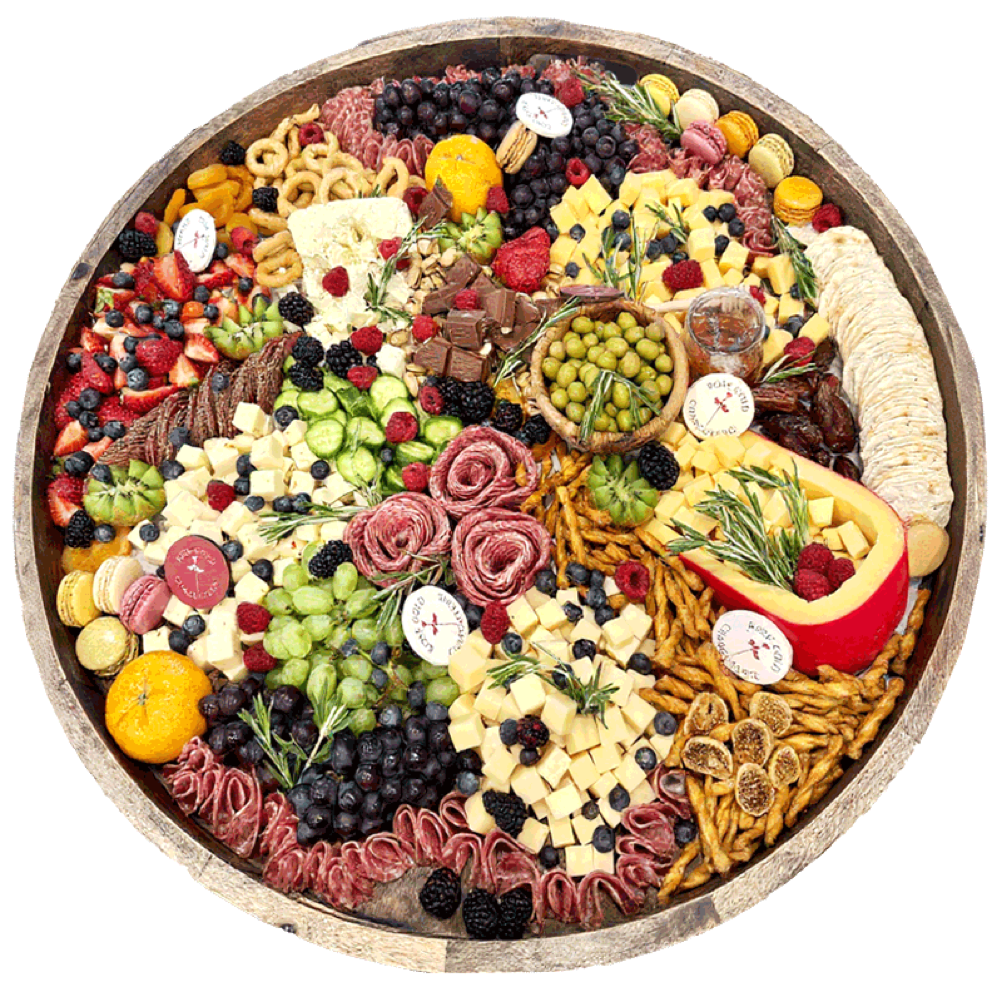 Custom charcuterie board for a San Dimas event with assorted cheeses, cured meats, fruit, and accompaniments